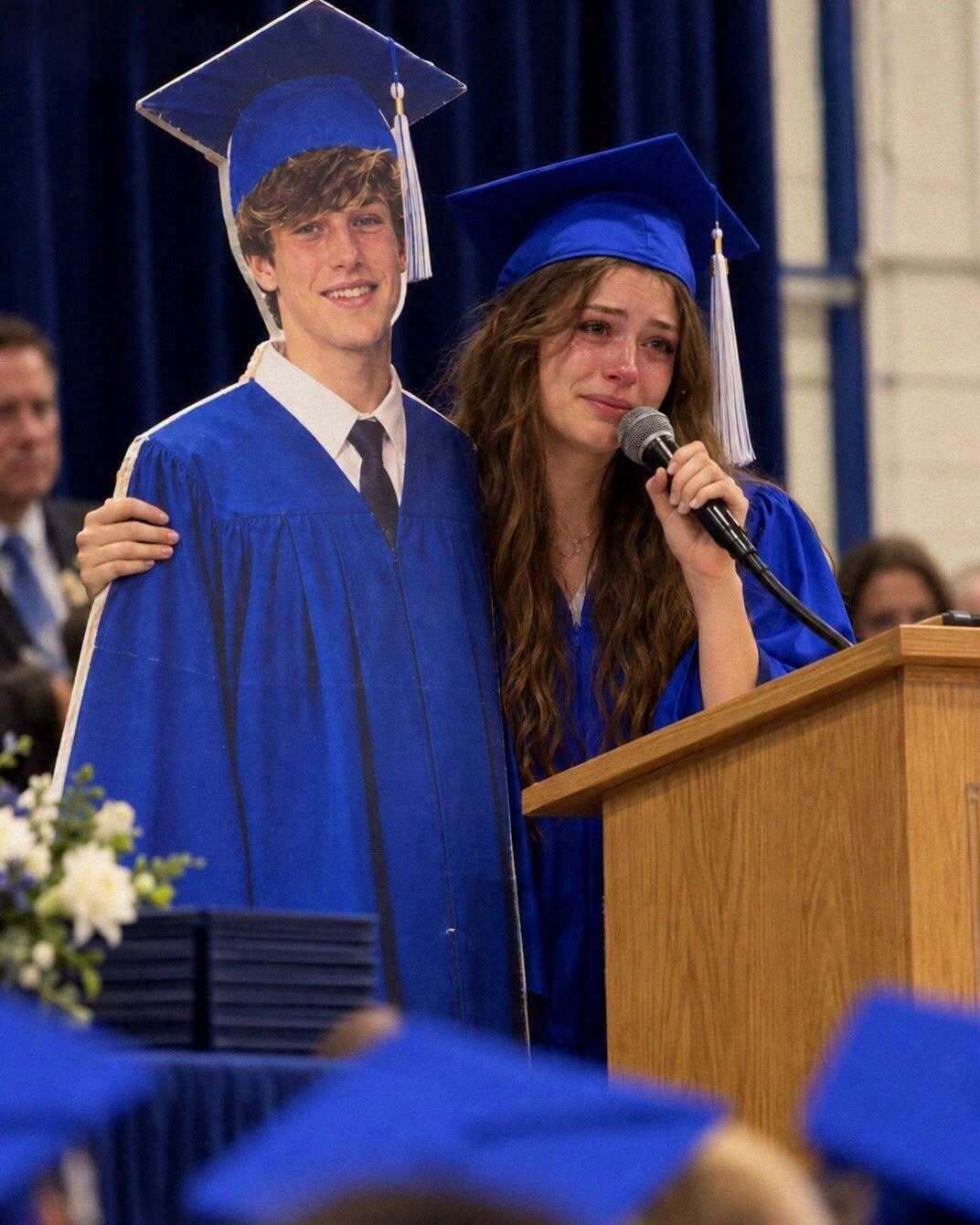 Teen Girl Brought a Cardboard Boy to Graduation – Classmates Teased Her Until She Stepped up to the Microphone